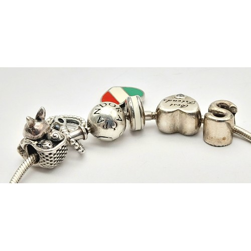 1188 - A Pandora Silver Bracelet with Charms. Original packaging.