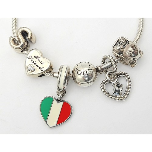 1188 - A Pandora Silver Bracelet with Charms. Original packaging.