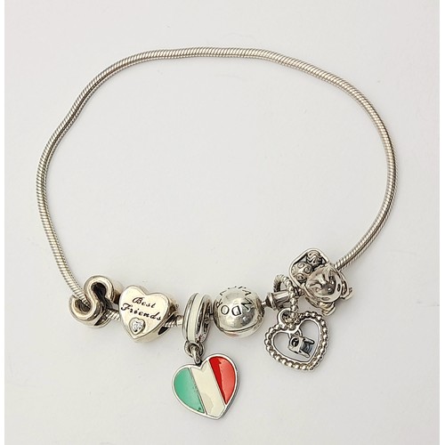 1188 - A Pandora Silver Bracelet with Charms. Original packaging.