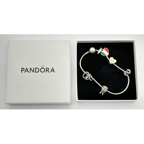 1188 - A Pandora Silver Bracelet with Charms. Original packaging.