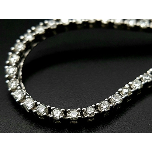 7 - An Icebox 14k White Gold Diamond Tennis Necklace. 256 brilliant round cut diamonds - 7ctw, approx. 5... 