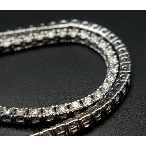 7 - An Icebox 14k White Gold Diamond Tennis Necklace. 256 brilliant round cut diamonds - 7ctw, approx. 5... 