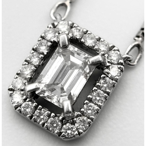 147 - An 18K Gold Emerald Cut Diamond Pendant on an 18K White Gold Disappearing Necklace. 7mm pendant. 44c... 