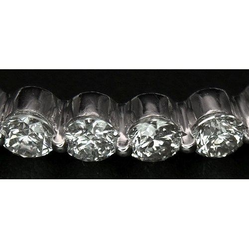 119 - A Pair of 18K White Gold and Diamond Oval Hoop Earrings. 48 diamonds in total - 2ctw approx. 6.3g to... 