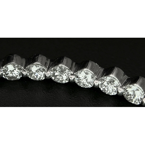 119 - A Pair of 18K White Gold and Diamond Oval Hoop Earrings. 48 diamonds in total - 2ctw approx. 6.3g to... 