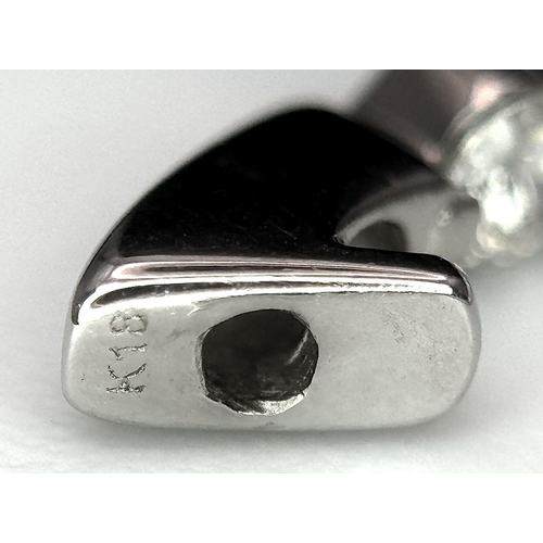 119 - A Pair of 18K White Gold and Diamond Oval Hoop Earrings. 48 diamonds in total - 2ctw approx. 6.3g to... 