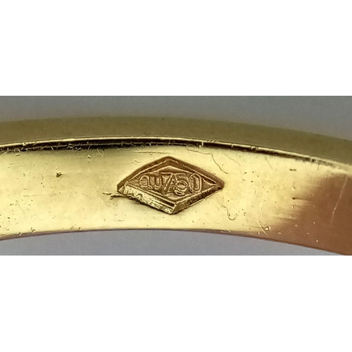 336 - An 18K Yellow Gold Diamond Solitaire Ring. A 0.75ct brilliant round cut diamond - SI1 clarity. Tinte... 