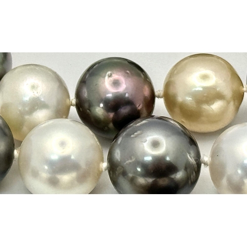 42 - A Tahitian and South Sea Pearl Necklace with an 18K White Gold Clasp. Pearls 12/14mm. 112g total wei... 