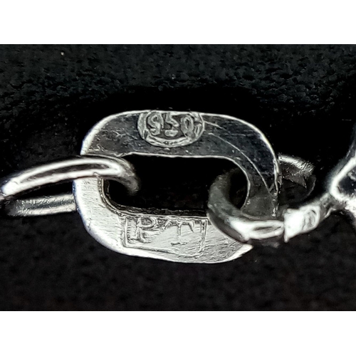 56 - An Art Deco Platinum and Diamond Lavaliere Necklace. 3.2ctw of old European round cut diamonds with ... 