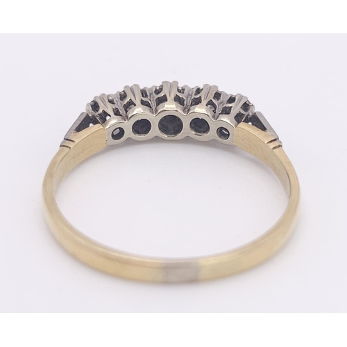417 - A Vintage 18K Gold and Platinum Five Diamond Ring. Size Q. 2.9g total weight.