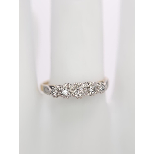 417 - A Vintage 18K Gold and Platinum Five Diamond Ring. Size Q. 2.9g total weight.