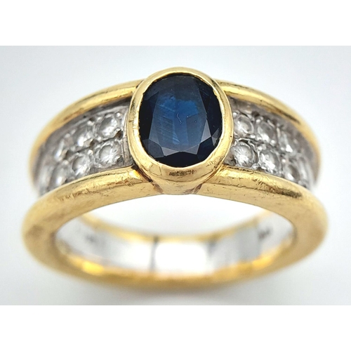 203 - AN 18K YELLOW AND WHITE GOLD BAND RING WITH DIAMOND SHOULDERS AND ONYX CENTRE STONE .  11.2gms    si... 