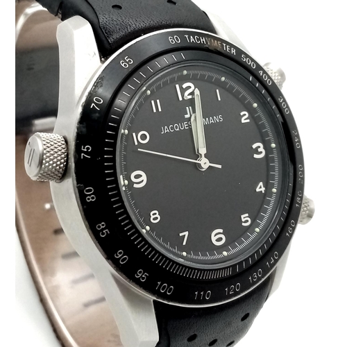 396 - A Jacques Lemans Dualtime Chronograph Gents Watch. Silver tone face with three sub dials and a class... 