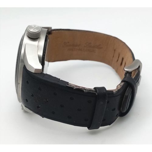 396 - A Jacques Lemans Dualtime Chronograph Gents Watch. Silver tone face with three sub dials and a class... 