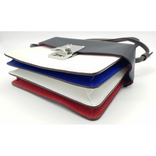 727 - A Sassy Volon Multi-Coloured Leather Hand/Shoulder Bag. Red, white, blue and brown leather exterior.... 