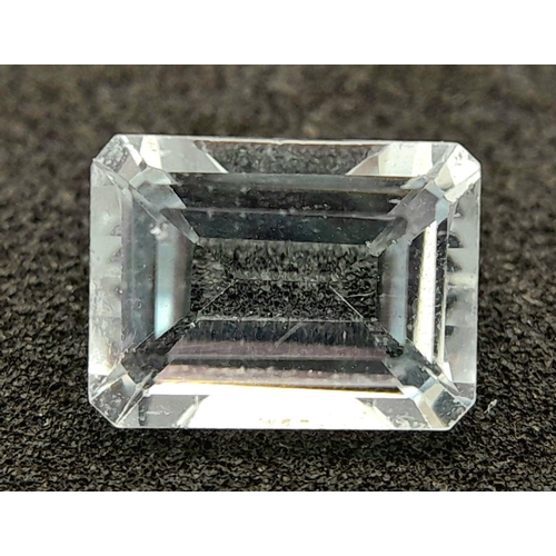 720 - A 1.71ct NATURAL AQUAMARINE IN EMERALD SHAPE , COMES WITH INDEPENDANT LABORATORY REPORT .