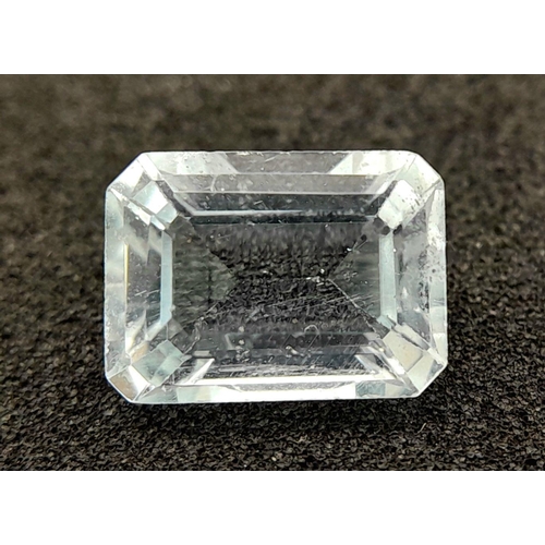 713 - A 1.75ct NATURAL AQUAMARINE IN EMERALD SHAPE, COMES WITH INDEPENDANT LABORATORY REPORT.