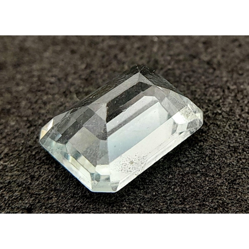 713 - A 1.75ct NATURAL AQUAMARINE IN EMERALD SHAPE, COMES WITH INDEPENDANT LABORATORY REPORT.