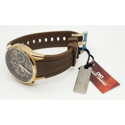 706 - A JORG GRAY CHRONOGRAPH IN ROSE GOLD COLOUR WITH 3 SUBDIALS AND BROWN RUBBER STRAP, NEW AND UNWORN .... 