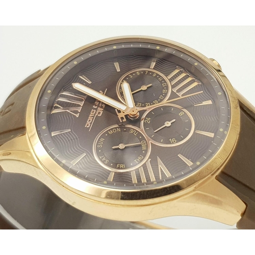 706 - A JORG GRAY CHRONOGRAPH IN ROSE GOLD COLOUR WITH 3 SUBDIALS AND BROWN RUBBER STRAP, NEW AND UNWORN .... 