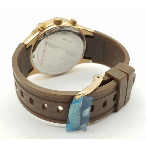 706 - A JORG GRAY CHRONOGRAPH IN ROSE GOLD COLOUR WITH 3 SUBDIALS AND BROWN RUBBER STRAP, NEW AND UNWORN .... 