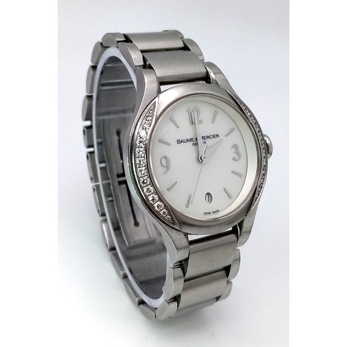 413 - A Baume and Mercier Diamond Quartz Ladies Watch. Stainless steel bracelet and case - 30mm. Diamond b... 