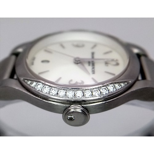 413 - A Baume and Mercier Diamond Quartz Ladies Watch. Stainless steel bracelet and case - 30mm. Diamond b... 