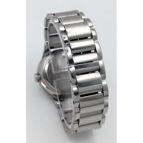 413 - A Baume and Mercier Diamond Quartz Ladies Watch. Stainless steel bracelet and case - 30mm. Diamond b... 