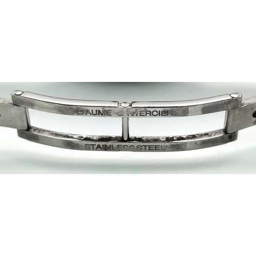 413 - A Baume and Mercier Diamond Quartz Ladies Watch. Stainless steel bracelet and case - 30mm. Diamond b... 
