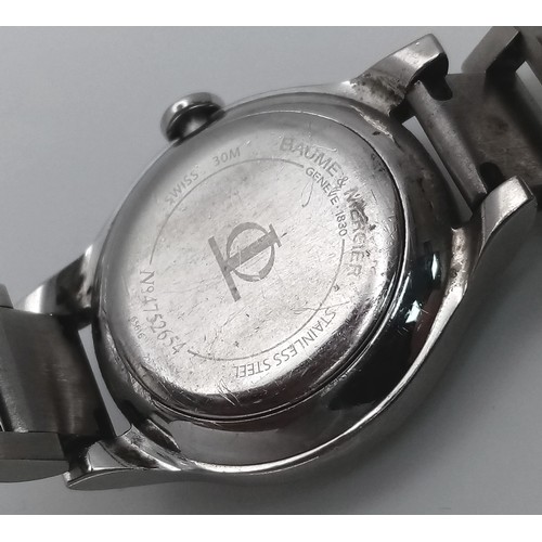 413 - A Baume and Mercier Diamond Quartz Ladies Watch. Stainless steel bracelet and case - 30mm. Diamond b... 