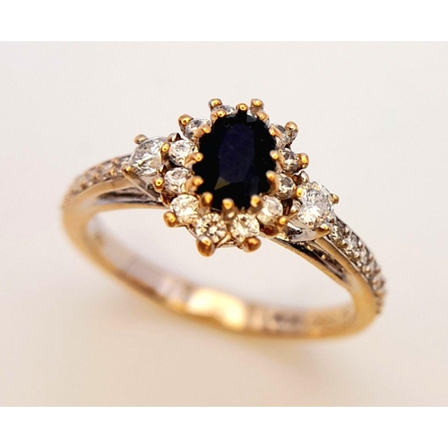 446 - An 18K Gold Sapphire and White Stone Ring. Size N. 3.3g