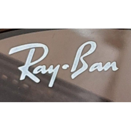 833 - A Pair of Ray-Ban Ladies Sunglasses.