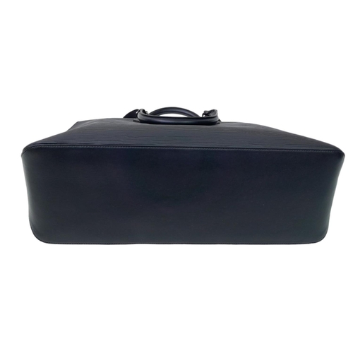 692 - A Montblanc Black 4810 Tote Bag. Textured leather exterior with silver-toned hardware, two rolled le... 