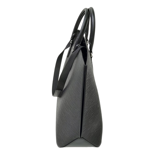 692 - A Montblanc Black 4810 Tote Bag. Textured leather exterior with silver-toned hardware, two rolled le... 