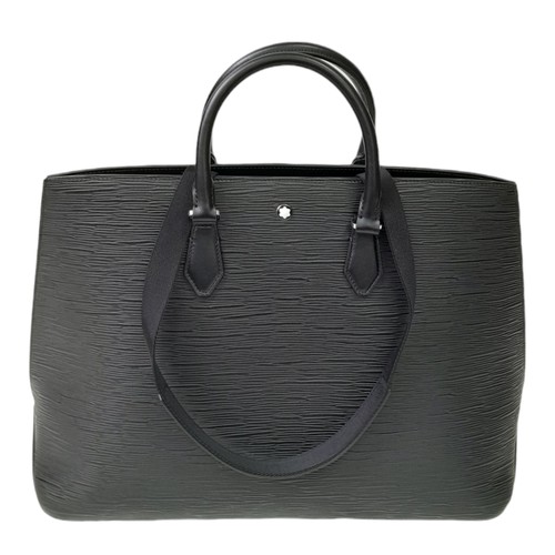 692 - A Montblanc Black 4810 Tote Bag. Textured leather exterior with silver-toned hardware, two rolled le... 