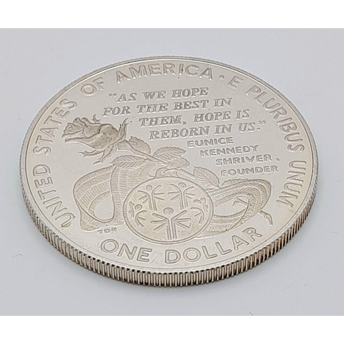 755 - A 1995 Special Olympics One Dollar Silver Coin. 26.8g