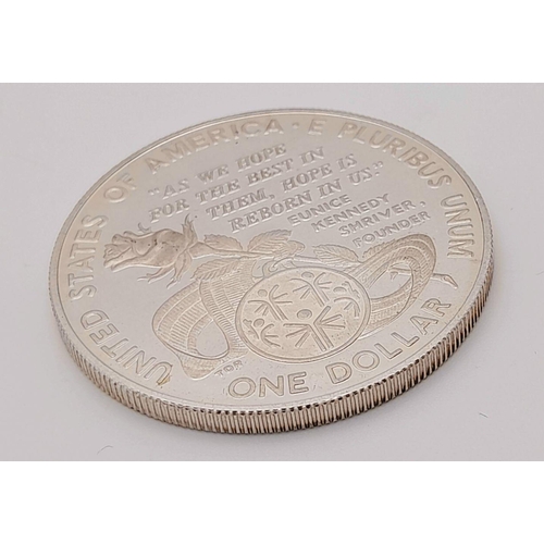 755 - A 1995 Special Olympics One Dollar Silver Coin. 26.8g
