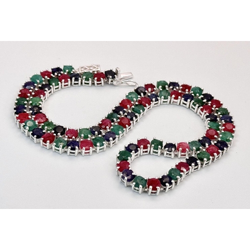 888 - A Ruby, Emerald and Sapphire Tennis Necklace - Set in 925 Silver. 45cm length. CD-1495
