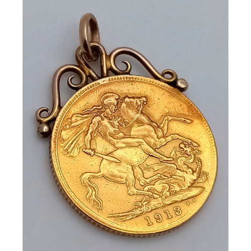 12 - A 1913 George V Full Sovereign - 22k Gold. With 9k pendant attachment. 8.6g