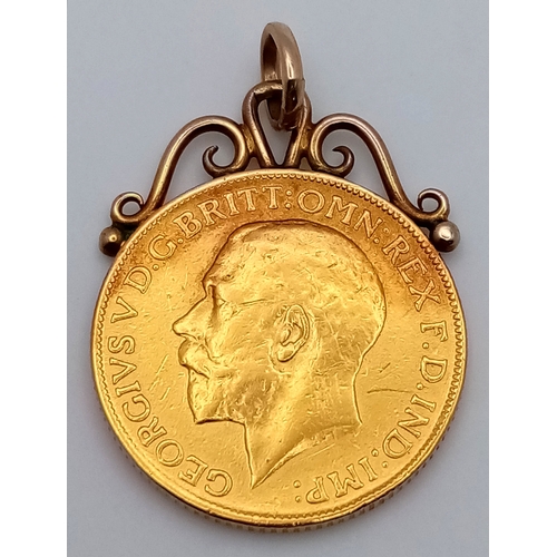12 - A 1913 George V Full Sovereign - 22k Gold. With 9k pendant attachment. 8.6g