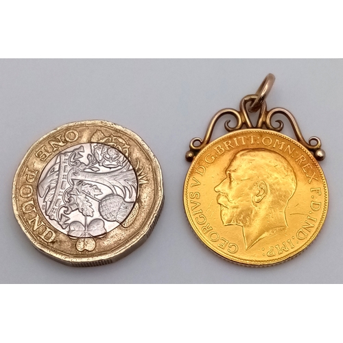 12 - A 1913 George V Full Sovereign - 22k Gold. With 9k pendant attachment. 8.6g
