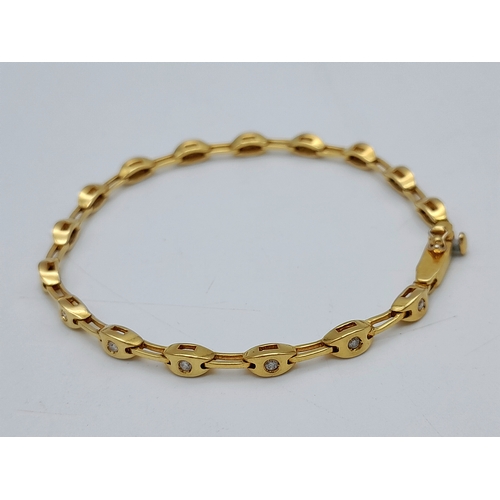 27 - A Stylish 18K Yellow Gold Diamond Tennis Bracelet. 16cm. 10g