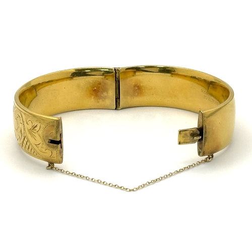 429 - A Vintage 9K Gold Plated (20 microns) Bangle. Decorative band with clip open design. 40g.