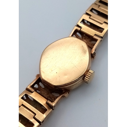 742 - A Vintage 9K Gold Rotary 21 Jewel Ladies Watch. 9k gold bracelet and case - 16mm. Gold tone dial. Me... 