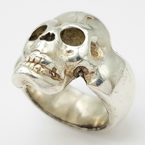 349 - A STERLING SILVER SKULL RING - 33.8G. SIZE Y. SC5011