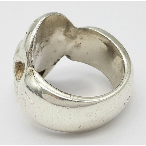 349 - A STERLING SILVER SKULL RING - 33.8G. SIZE Y. SC5011