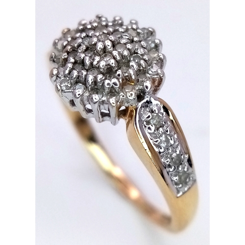 419 - A 9K YELLOW GOLD DIAMOND CLUSTER RING - 0.25CT. 3.7G. SIZE N. SC5066