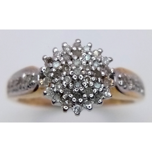 419 - A 9K YELLOW GOLD DIAMOND CLUSTER RING - 0.25CT. 3.7G. SIZE N. SC5066