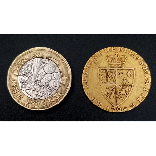 32 - A 1798 GEORGE III GUINEA COIN. FIFTH HEAD. 22K GOLD.  8.3G. F+, BUT PLEASE SEE PHOTOS. C-5022