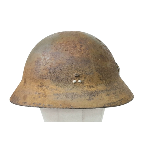 54 - A WW2 Japanese Type 90 Home Guard Leaders Helmet with liner and chin strap. Named to the 7th Guard C... 